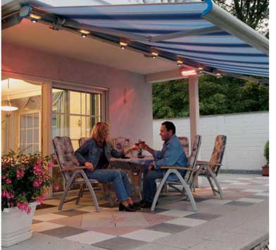 couple seated under Illuminated awning